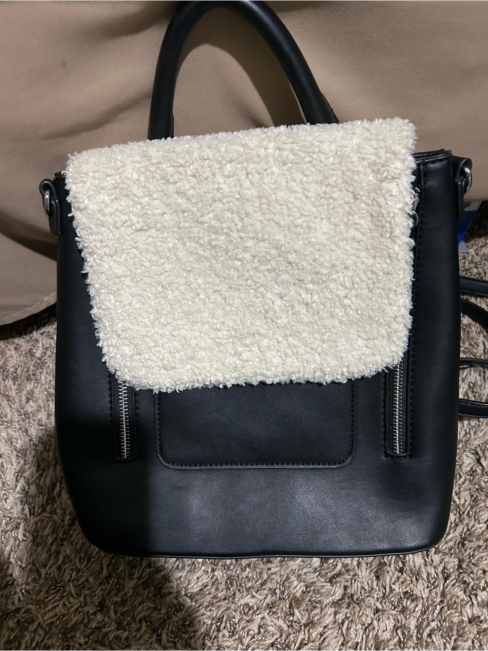 MMS Design Studio Black back pack style with Cream Shearling Flap